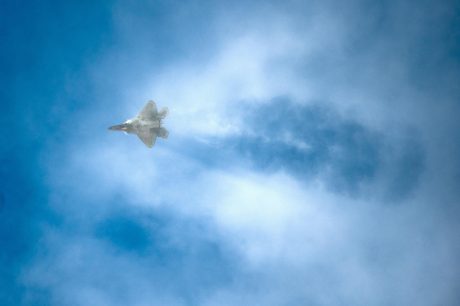 F-22 zooms through the clouds