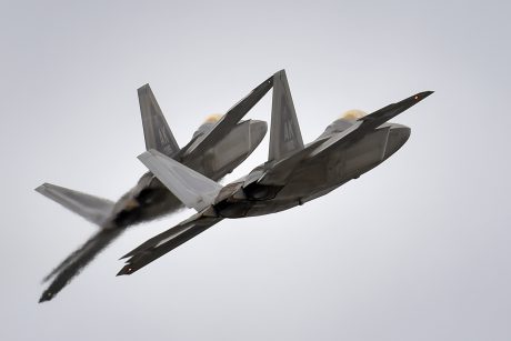 Two F-22 Raptors from Joint Base Elmendorf-Richardson, Alaska’s 3rd Wing conduct approach training, Thursday, March 24, 2016. The F-22 is the U.S. Air Force’s premium fifth-generation fighter asset. (U.S. Air Force photo/Justin Connaher)