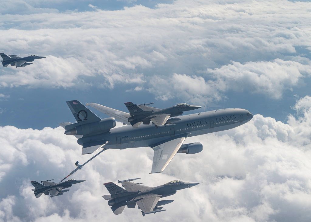 A commercial KDC‐10 tanker aircraft refuels a U.S. Air Force F‐16 Fighting Falcon from the 51st Fighter Wing