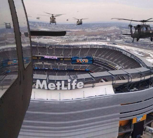 Photo A C-5 Galaxy flies over Gillette Stadium at New England Patriot's Game 