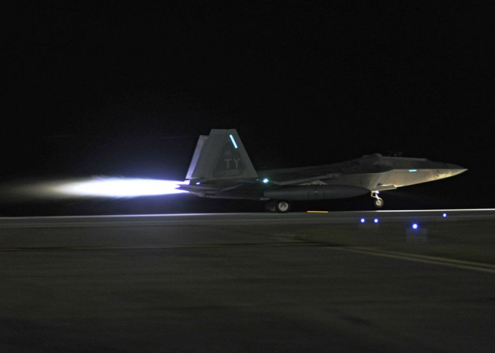 A 95th Fighter Squadron F-22 Raptor accelerates as it takes off of the Tyndall Air Force Base, Fla., flightline. Four 95th FS Raptors flew to Spangdahlem Air Base, Germany, to train with allied air forces and U.S. services through mid-September. (U.S. Air Force photo by Airman 1st Class Sergio A. Gamboa/Released)