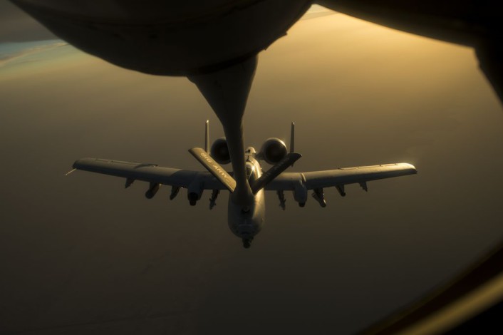 A U.S. Air Force A-10 Warthog, assigned to the 163rd Expeditionary Fighter Squadron, receives fuel from a KC-135 Stratotanker, 340th Expeditionary Aerial Refueling Squadron, over Southwest Asia, Oct. 13, 2015. Coalition forces fly daily missions in support of Operation Inherent Resolve. (U.S. Air Force photo by Senior Airman Taylor Queen/Released)