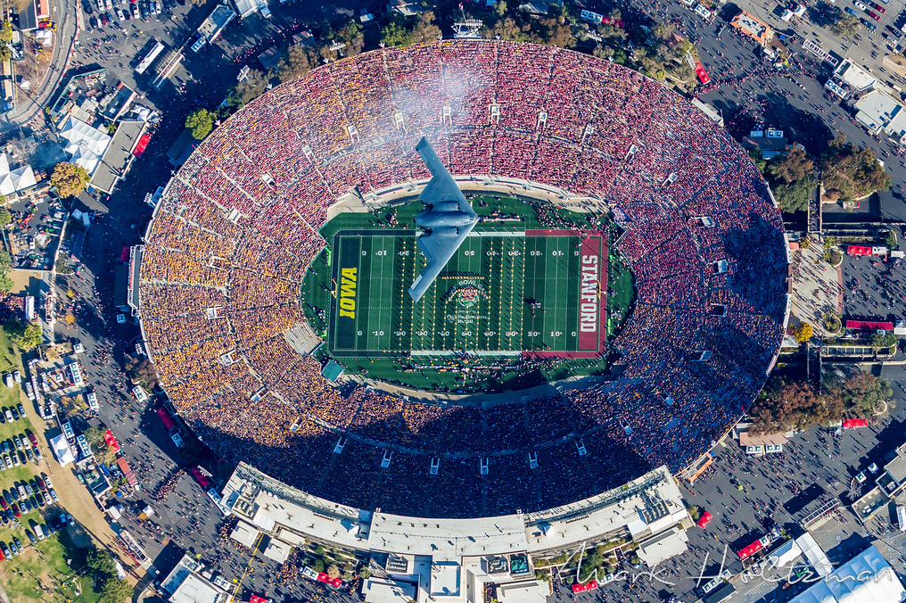 Freaking awesome photo of the B2 Stealth Bomber doing the Rose Bowl