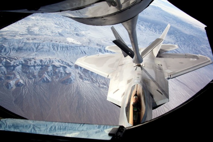An F-22 Raptor assigned to the 95th Fighter Squadron, Tyndall Air Force Base, Fla., connects to the boom of a KC-135 Stratotanker to refuel during Exercise Red Flag 16-1 Feb. 4, 2016. F-22 Raptors, along with approximately 30 other airframes, are participating in the advanced training program administered by the United States Warfare Center and executed through the 414th Combat Training Squadron, both located at Nellis AFB. (U.S.  Air Force photo by Master Sgt. Burt Traynor/Released)