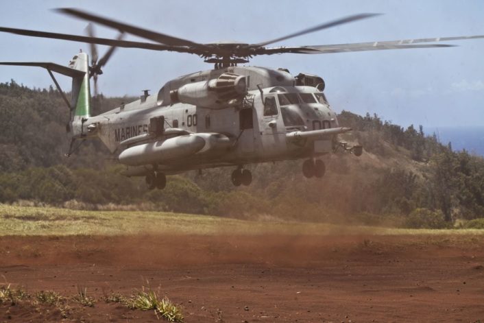 U.S. Marine CH-53E Super Stallion helicopters assigned to Marine Heavy Helicopter Squadron 463, land in Landing Zone Canes on Oahu, Hawaii, April 29th, 2016. HMH-463 extracted the 3rd Battalion, 3rd Marine Regiment from Kahuku Training Area at the end of their field exercise by conducting multiple waves of assault support lift with the Army's 25th Combat Aviation Brigade.  (U.S. Marine Corps photo by Capt. Tim Irish)
