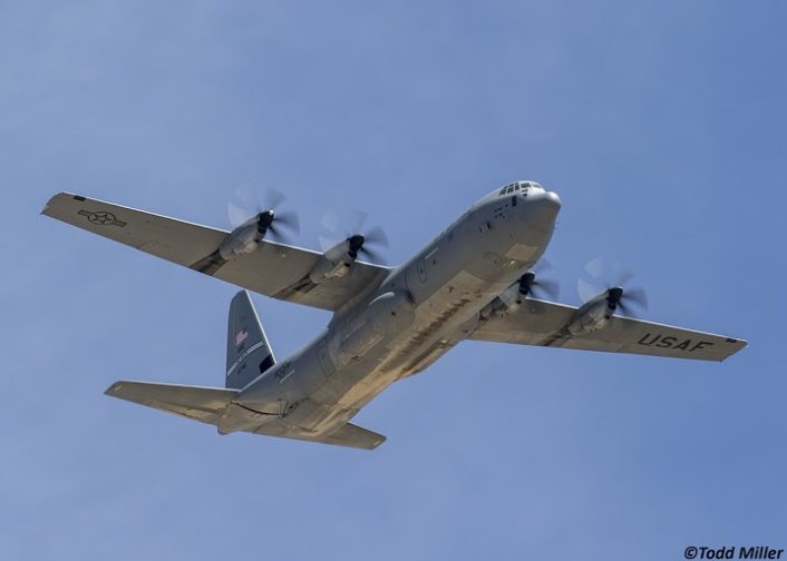 Air Mobility Command C-130J-30 of Little Rock AFB, AR overflies Keno Airfield on the NTTR during JFEX (June 2016).  The "J's" ramp is open as it prepares to drop U.S. Army paratroppers from the 82nd Airborne Division.