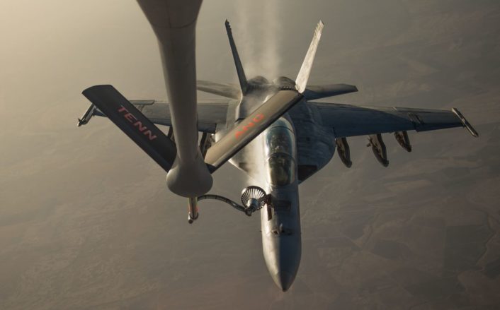 A U.S. Navy F/A-18 Super Hornet receives fuel from a KC-135 Stratotanker over Iraq in support of Operation Inherent Resolve Oct 17, 2016. The KC-135 provides the core aerial refueling capability for the U.S. Air Force and has excelled in this role for more than 50 years. (U.S. Air Force photo by Staff Sgt. Douglas Ellis/Released)