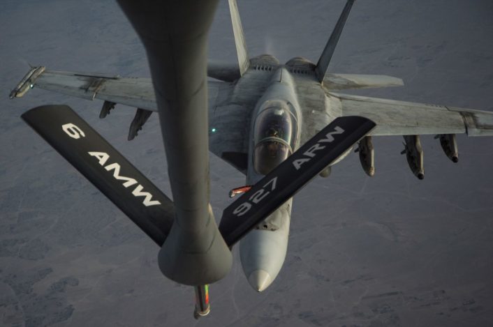 A U.S. Navy F/A-18 Super Hornet approaches a KC-135 Stratotanker refueling drogue over Iraq Sept. 28, 2016. Airmen from the 340th Expeditionary Air Refueling Squadron refueled U.S. Navy F/A-18 Super Hornets over Iraq in support of Combined Joint Task Force-Operation Inherent Resolve. The U.S. and more than 60 coalition partners work together to eliminate Daesh and the threat they pose to Iraq and Syria. (U.S. Air Force photo/Tech. Sgt. Larry E. Reid Jr., Released)