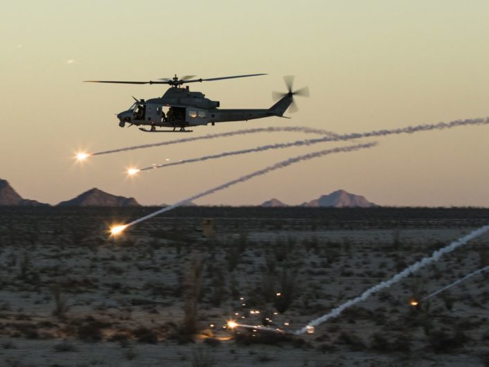 A U.S. Marine Corps UH-1Y Venom assigned to Marine Aviation Weapons and Tactics Squadron One (MAWTS-1) deploys flares during an urban close air support exercise at Yodaville, Yuma, Ariz., Sept. 30, 2016. The urban close air support exercise was part of Weapons and Tactics Instructor Course (WTI) 1-17, a seven-week training event, hosted by MAWTS-1 cadre, which emphasizes operational integration of the six functions of Marine Corps aviation in support of a Marine Air Ground Task Force. MAWTS-1 provides standardized advanced tactical training and certification of unit instructor qualifications to support Marine Aviation Training and Readiness and assists in developing and employing aviation weapons and tactics. (U.S. Marine Corps photo by Lance Cpl. Danny Gonzalez 1st MARDIV COMCAM)