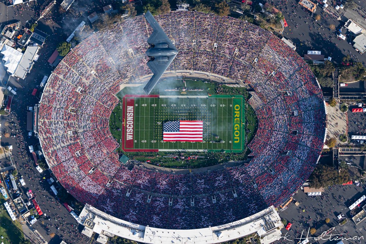 Freaking awesome photo of the B2 Stealth Bomber doing the Rose Bowl