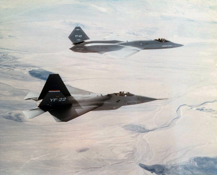 The YF-22 and YF-23 in formation.