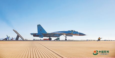 PLAN’s Naval Aviation University Performs J-15 Flight Training on Simulated Carrier Deck